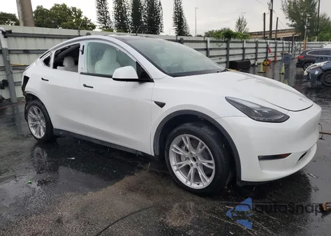 2023 Tesla Model Y from USA, damaged, VIN 7SAYGDED1PF962095